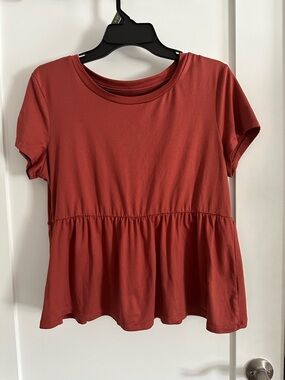 Pink Rose Short Sleeve Peplum Top in Rusty Red